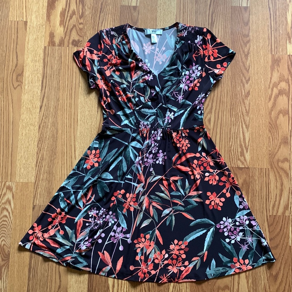 Wisp petite black dress with flower details.